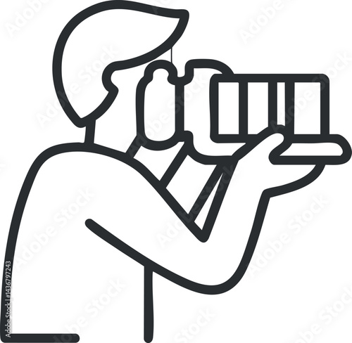 Outline icon of a person holding a camera and taking a photo with a professional lens