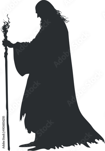 Silhouette of a wizard holding a magical staff wearing a long flowing robe and cloak