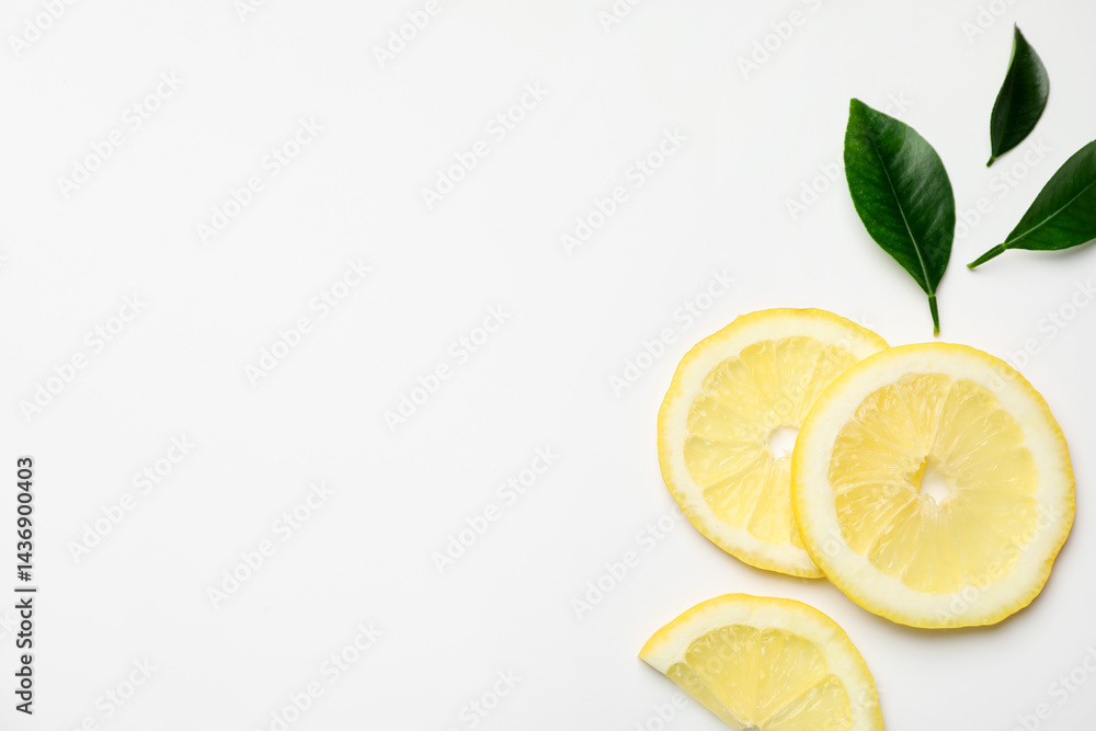 Slices of lemons on white background, flat lay. Space for text Slices of lemons on white background, flat lay. Space for text