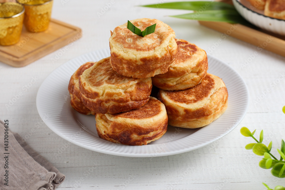 Kue Kamir. Kamir cake. served on a white plate. with copy space. originated from Pemalang, Middle Java, Indonesia. Kue Kamir. Kamir cake. served on a white plate. with copy space. originated from Pemalang, Middle Java, Indonesia.