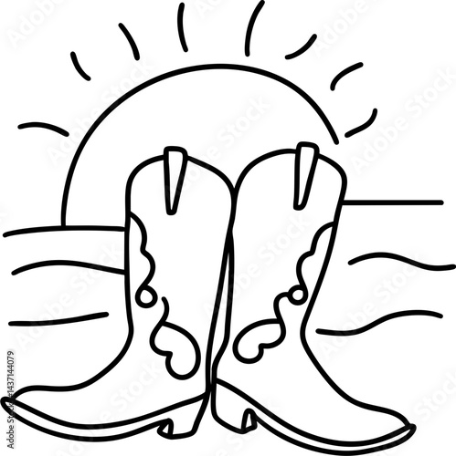 Stylish cowboy boots stand proudly against sunset backdrop, evoking sense of adventure and freedom