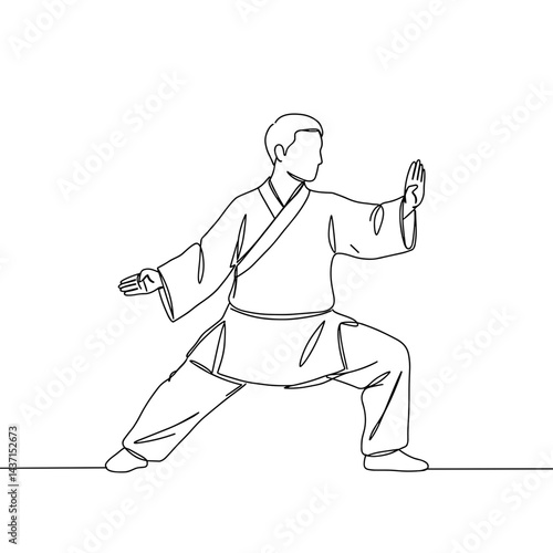 Senior practicing Tai Chi in a focused stance  
