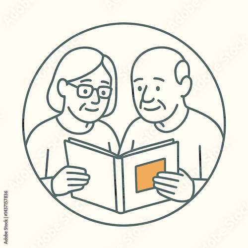 Elderly couple reading a photo album together against a light background  