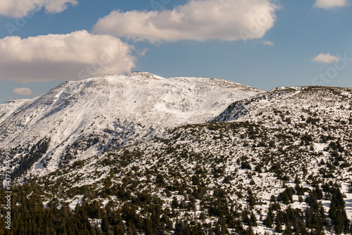 Mountain landscape in Poland. Babia Gora peak covered in winter snow. Babia Góra National Park.