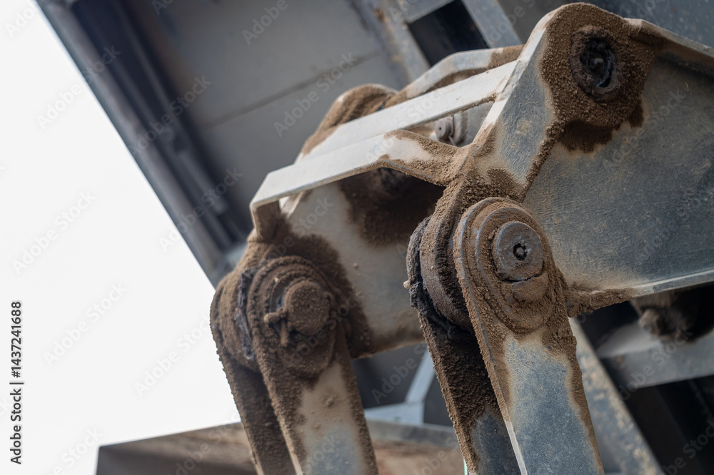 Urban environment close-up heavy machinery operation and construction equipment