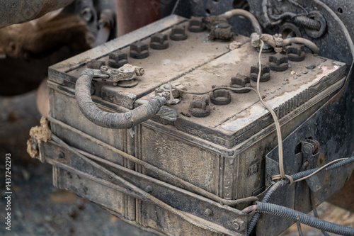 Obraz na płótnie Maintenance of vintage vehicle battery garage technical insight dusty environment close-up view w salonie