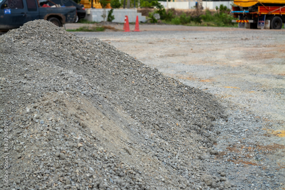 Construction site activity gravel pile urban area daylight low angle building foundations