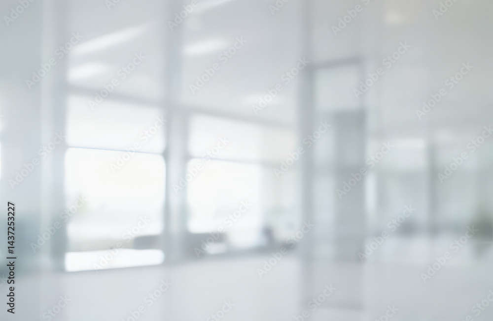 Blurred office interior with glass walls and bright light creates a modern space. Blurred office interior with glass walls and bright light creates a modern space.