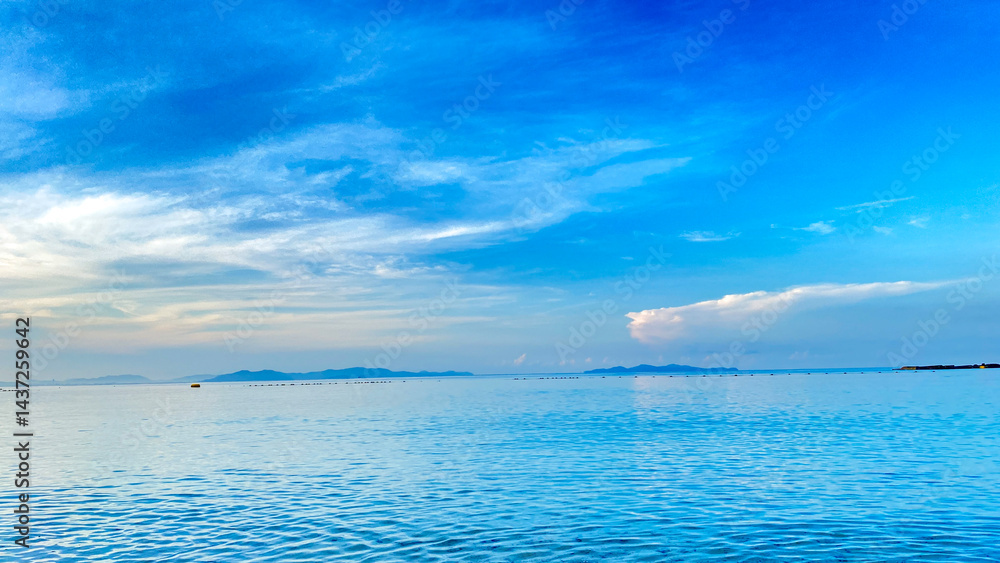 Fototapeta premium A tranquil seascape under a clear sky, reflecting peace, solitude, and natural beauty.