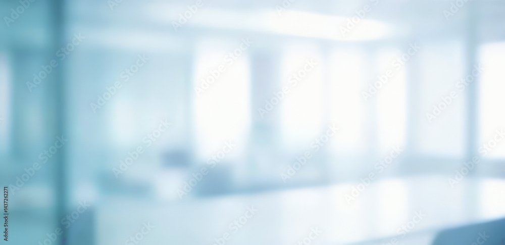 Blurred office interior with windows and light blue tones creates a clean background. Blurred office interior with windows and light blue tones creates a clean background.