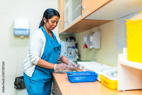 фотографія Nurse preparing medication in nursing home pharmacy