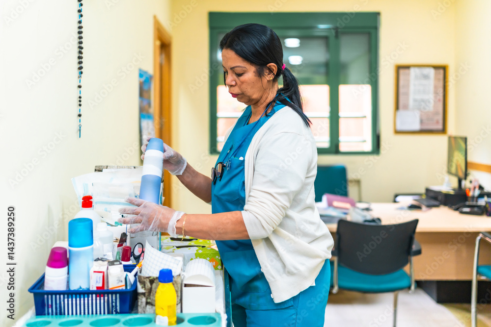 Nurse preparing medical equipment in nursing home