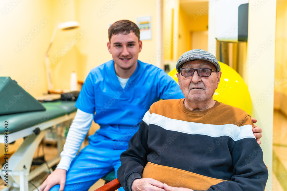 Young nurse comforting elderly man in nursing home
