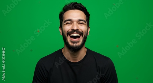 Wallpaper Mural Joyful Man Laughs Heartily Against Vibrant Green Background Torontodigital.ca