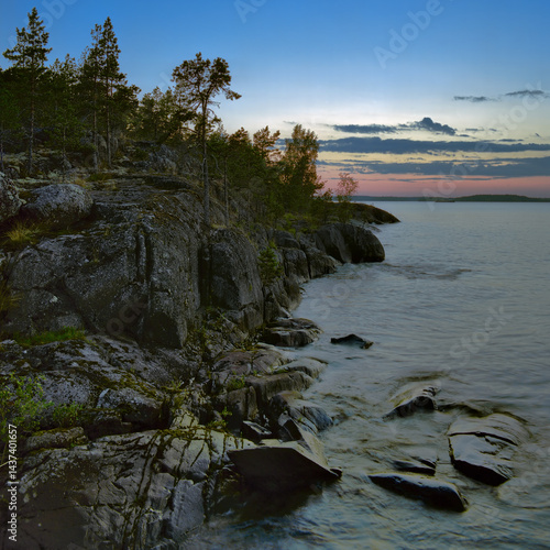 Obraz na płótnie Sunset at stony shore of Ladoga lake w salonie