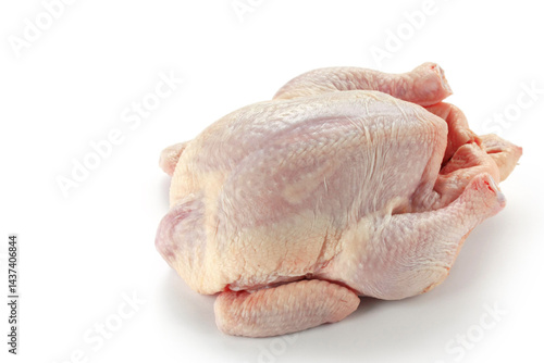 Whole raw chicken isolated on white background.