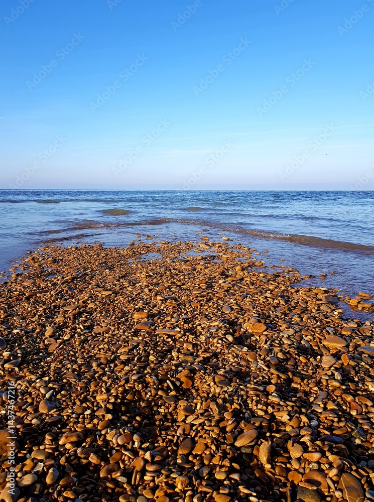 rocky beach and blue sky in autumn, south china sea