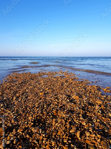 Obraz na płótnie rocky beach and blue sky in autumn, south china sea w salonie