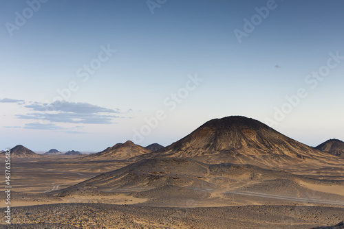 Obraz na płótnie Sunset lights on the black desert in Egypt w salonie