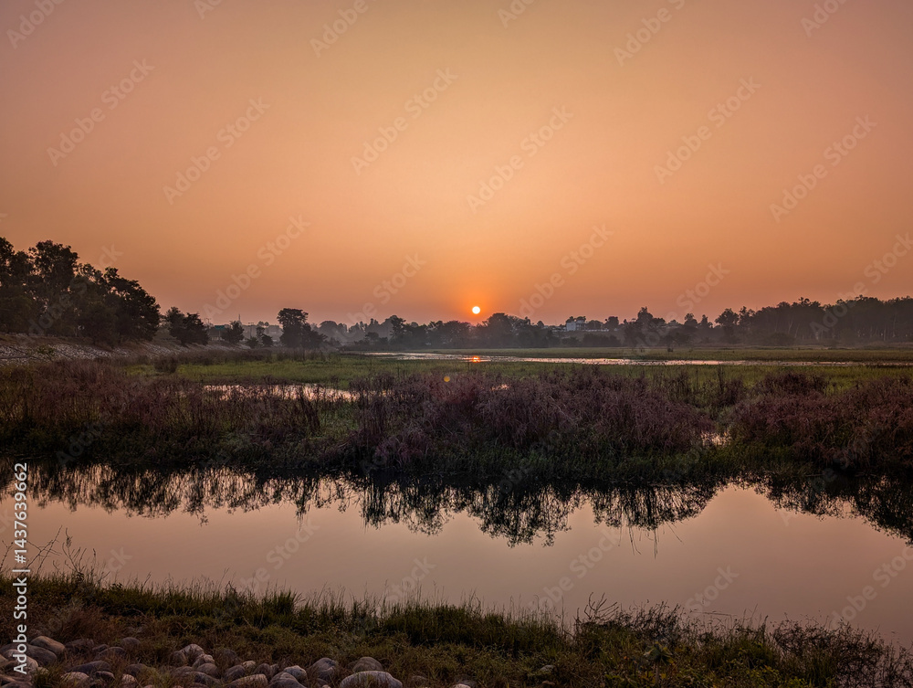 Obraz premium Serene Sunrise at Asan Barrage, Dehradun