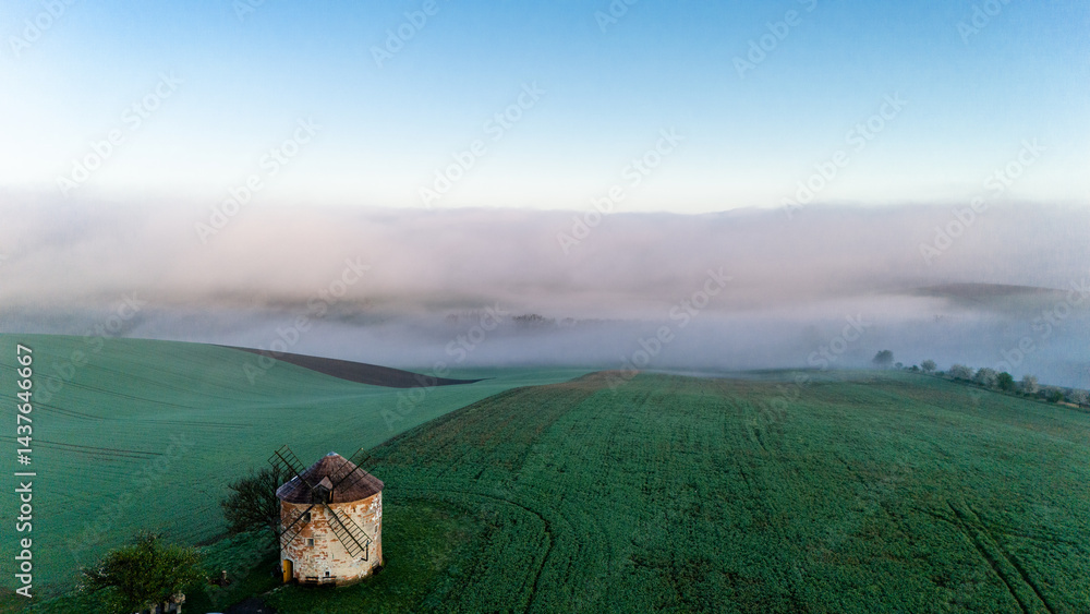 Traditional windmill in Kunkovice, Moravia, Czechia at sunrise