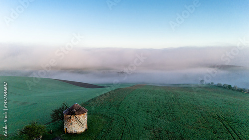 Obraz na płótnie Traditional windmill in Kunkovice, Moravia, Czechia at sunrise w salonie