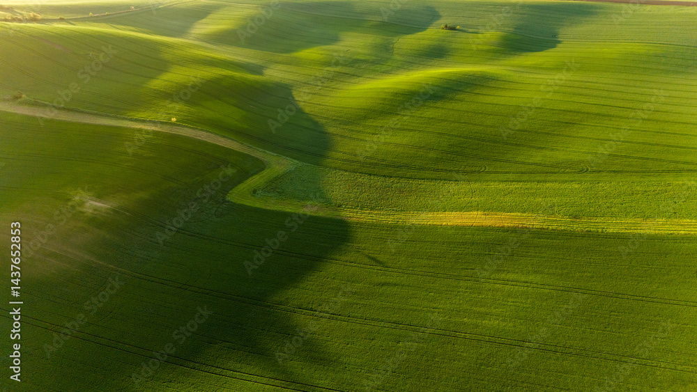 Golden Sunrise Over Rural Farmland – Aerial Drone Perspective