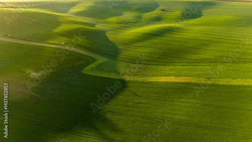 Obraz na płótnie Golden Sunrise Over Rural Farmland – Aerial Drone Perspective w salonie