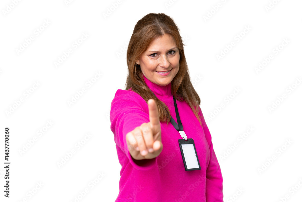 Middle-aged caucasian woman with ID card over isolated background showing and lifting a finger Middle-aged caucasian woman with ID card over isolated background showing and lifting a finger