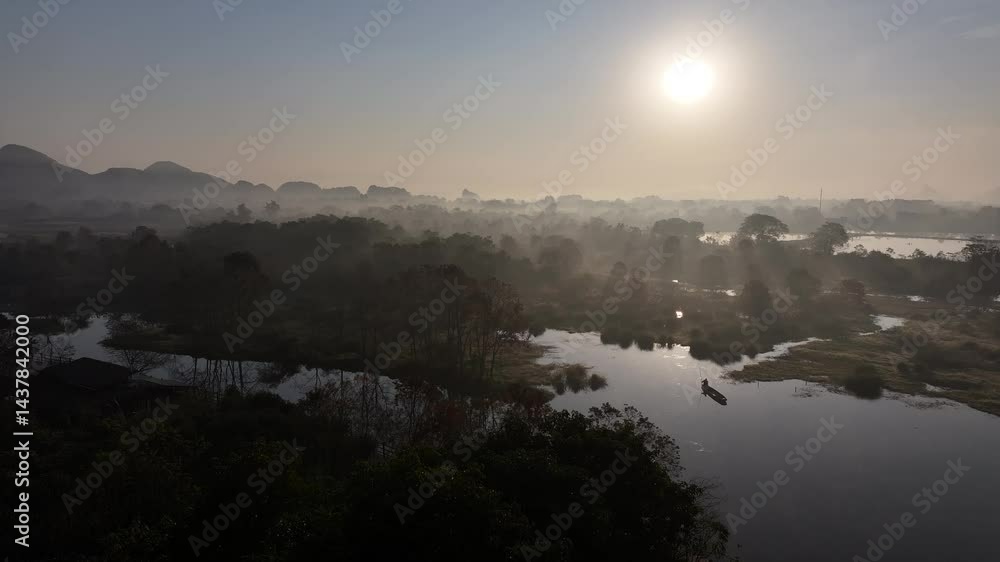 Misty aerial view of Huixian Wetland and Longshan in Guilin, China, resembling a traditional Chinese ink painting. Misty aerial view of Huixian Wetland and Longshan in Guilin, China, resembling a traditional Chinese ink painting.