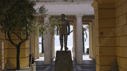 Bronze statue of sandro pertini overlooking the ligurian sea in savona. Action