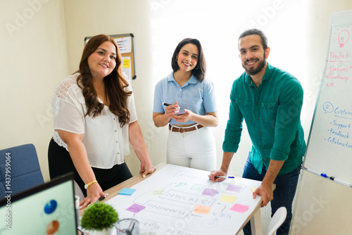 Startup team planning business strategy in modern office