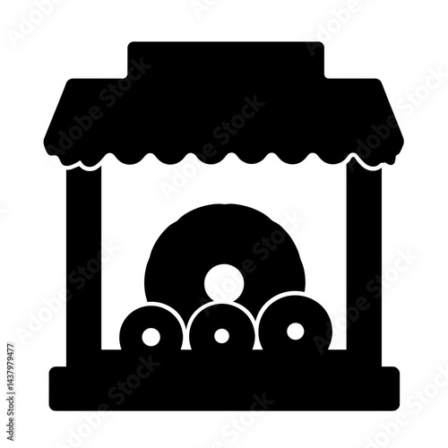Silhouette of donut shop window display, National Donut Day celebration