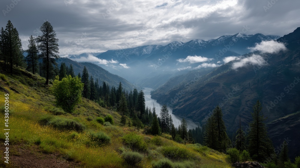 Fototapeta premium Majestic Mountain Valley Landscape Dramatic Clouds and Serene River