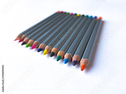 Colored pencils background. Color pencils on white background.