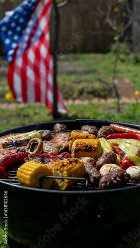 Принти на полотні Grilled vegetables on a barbecue with American flag in background, celebrating I