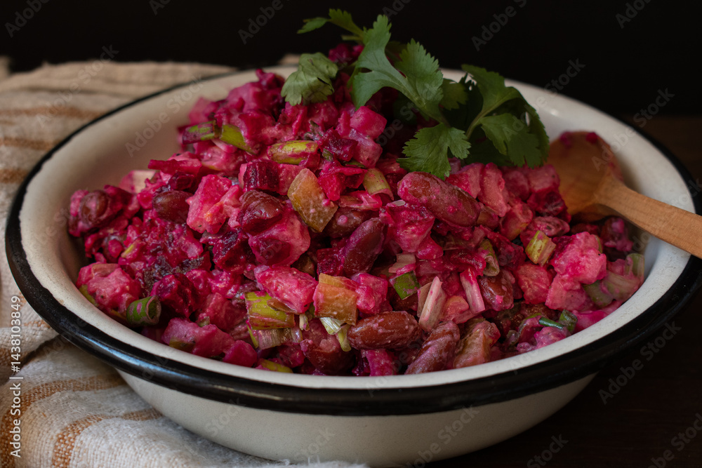 Vegan mixed vegetable salad served in enameled bowl Vegan mixed vegetable salad served in enameled bowl