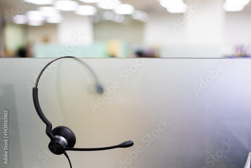Obraz na płótnie VOIP headset for callcenter on desk at customer service office. Communication support for sale support and telemaketing Helpdeskac w salonie