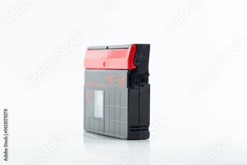 Obraz na płótnie Mini DV cassette tape isolated on white background w salonie