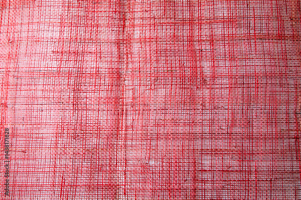 Top view Background texture of red cotton woven fabric.