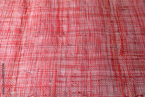 Obraz na płótnie Top view Background texture of red cotton woven fabric. w salonie