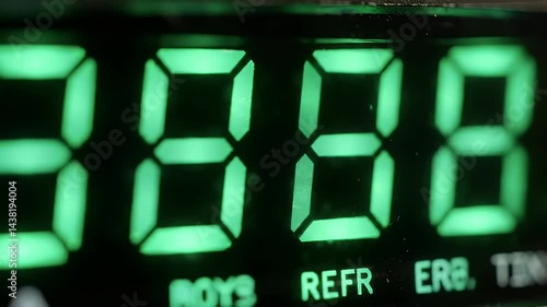 Close Up View Of Digital Clock Displaying Time