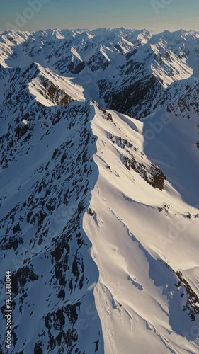 Vertical shot - snowy mountains - snow peaks
