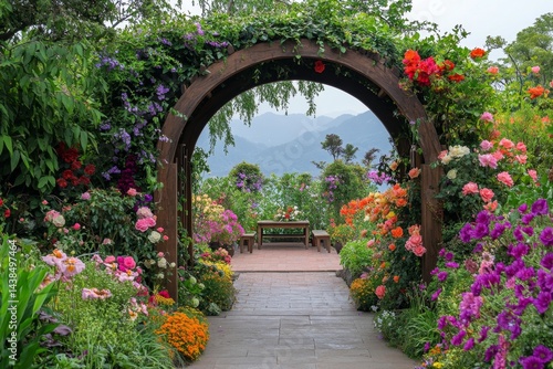 Fototapeta Naklejka Na Ścianę i Meble -  Scenic garden archway with vibrant blooms