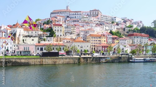 The picturesque view of Coimbra, Portugal as viewed from the Ponte de Santa Clara bridge