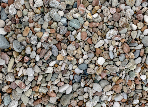 Photography Full frame of multicolored smooth pebbles natural stone texture background