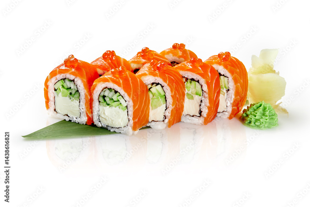 Delicious philadelphia uramaki sushi rolls are garnished with red caviar, served with wasabi and pickled ginger