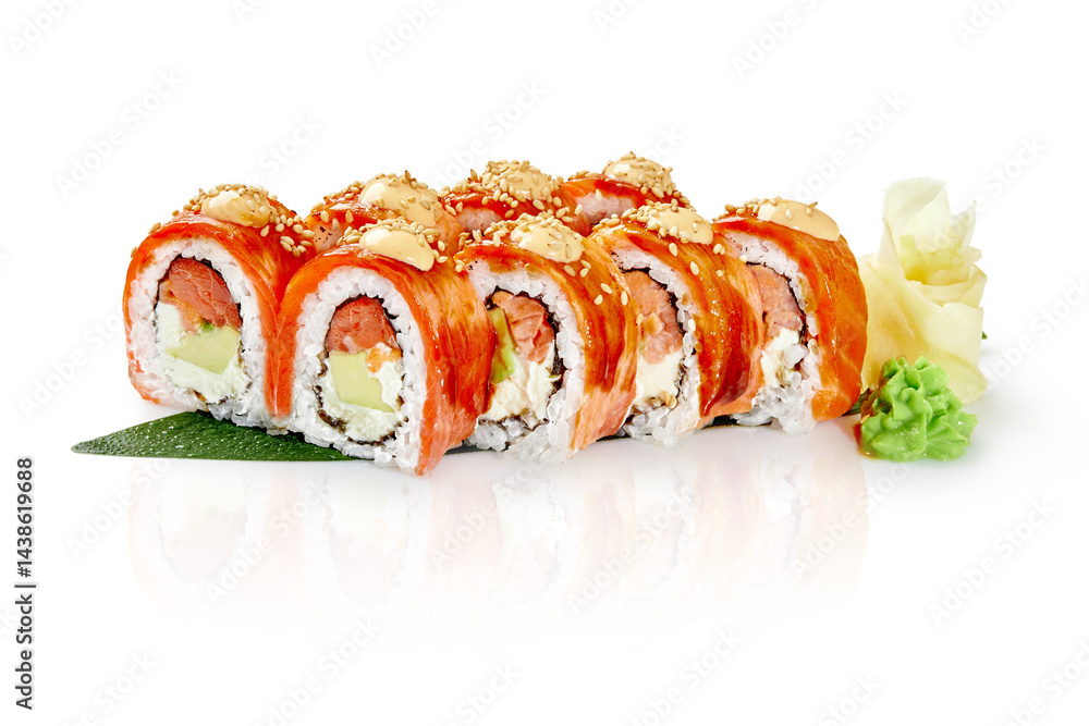 Philadelphia uramaki sushi rolls with salmon, sesame seeds and spicy mayo on white background