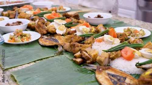 Enjoying a boodle fight feast in the Philippines with friends and family