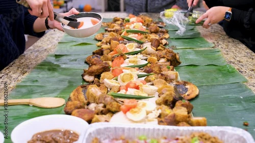 Experience boodle fight tradition in the Philippines with flavorful dishes and fun